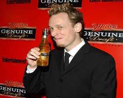 John Asher consuming alcohol